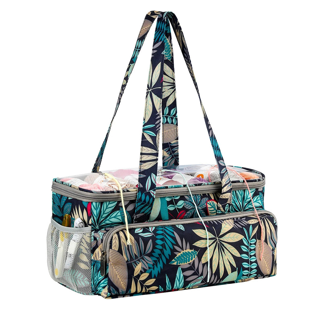 A colorful, floral-patterned Knitting Bag: Yarn Organizer with a rectangular shape, multiple compartments for optimal yarn storage, mesh side pockets, and long, sturdy straps for carrying.