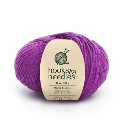 Image of Merino Essence yarn, showcasing its soft texture and natural hues, ideal for creating cozy, elegant knitwear.