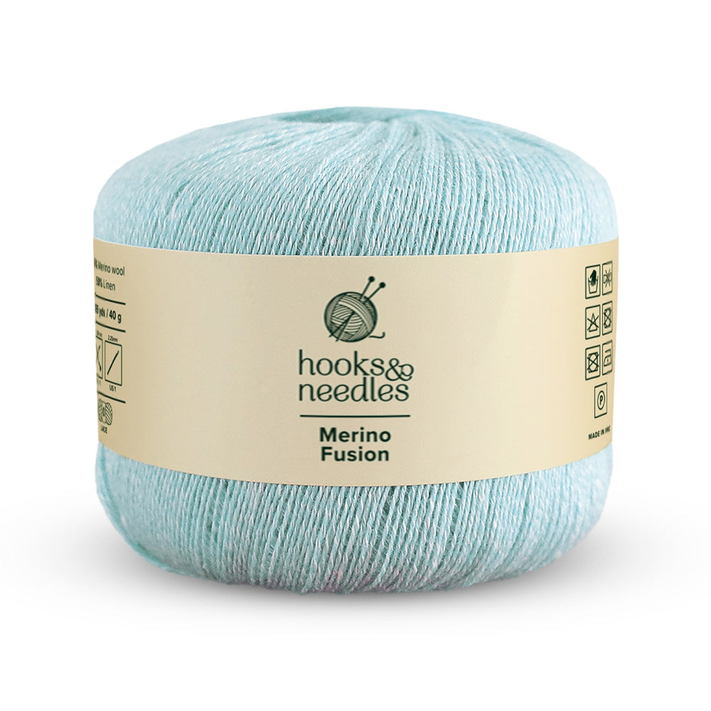 Image of Merino Fusion yarn, showcasing its soft texture, ideal for creating cozy, elegant knitwear.