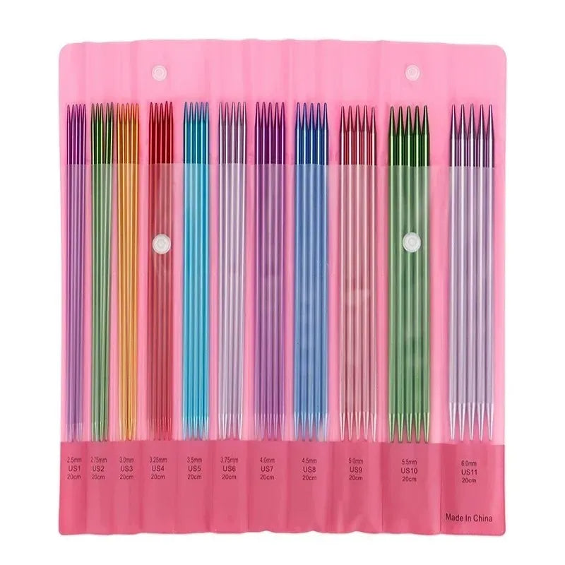 A pink case holding a 55 Pcs Double Pointed Knitting Needle Set, featuring 11 pairs of durable double pointed needles in various colors and sizes, labeled from 2.25 mm to 8.0 mm.