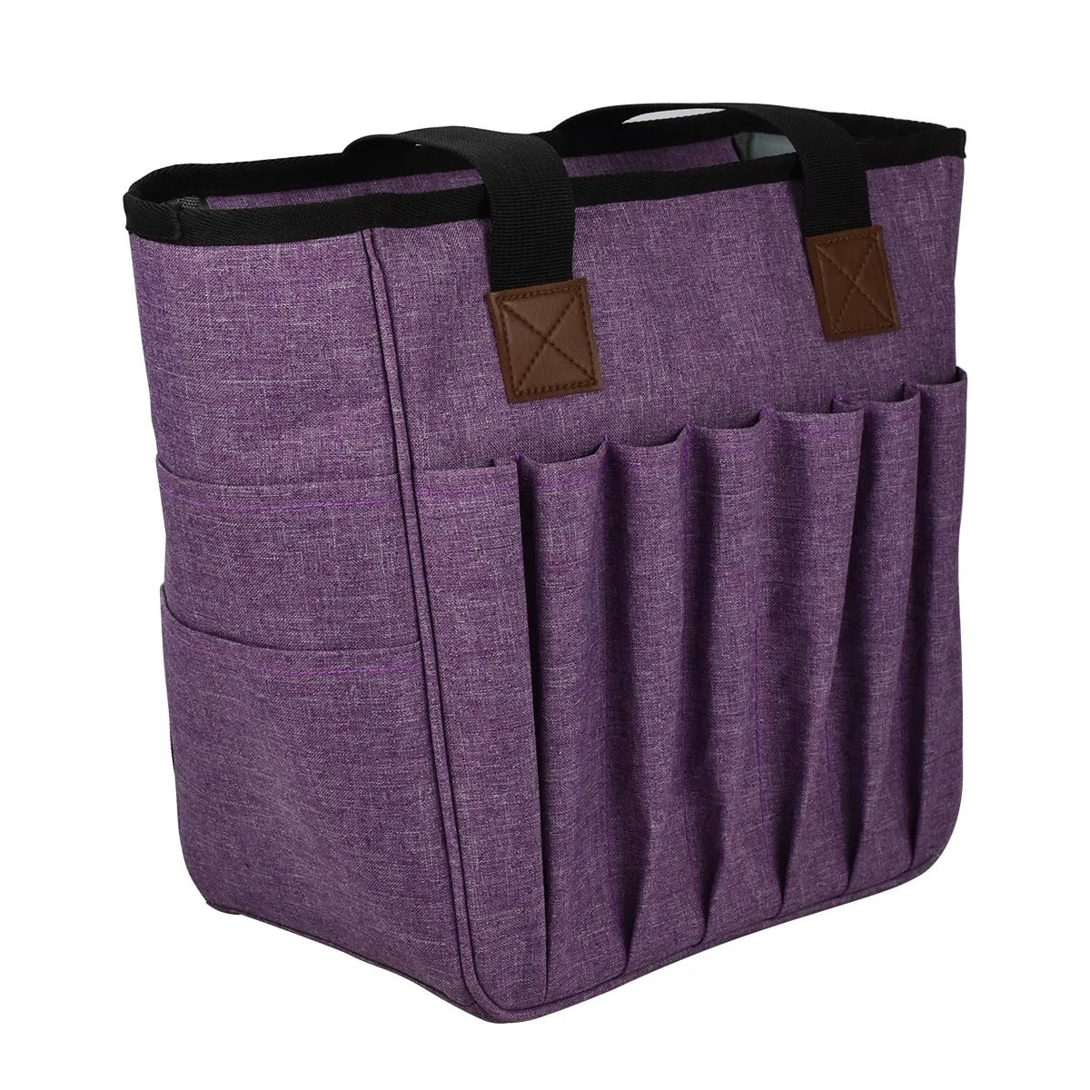 The Yarn Organizer Tote is a purple bag with black handles and brown accents, designed for knitting enthusiasts and featuring exterior pockets for convenient storage.