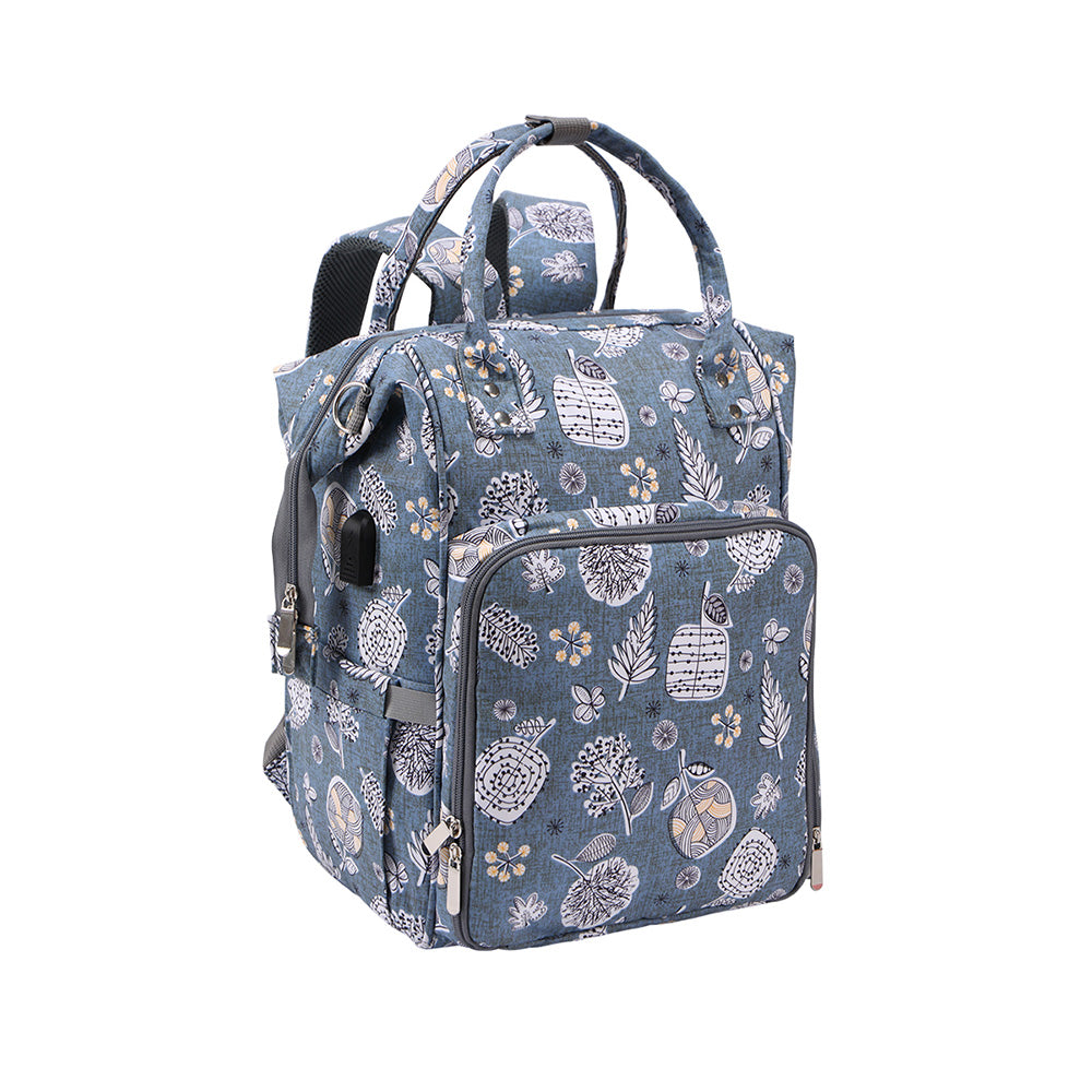 A blue backpack with a floral and hedgehog pattern, featuring multiple compartments, adjustable straps, and a top handle. Perfect for carrying Oxford Serenity Luxe Bag - Yarn Organizer essentials or as a Yarn Organizer on the go.
