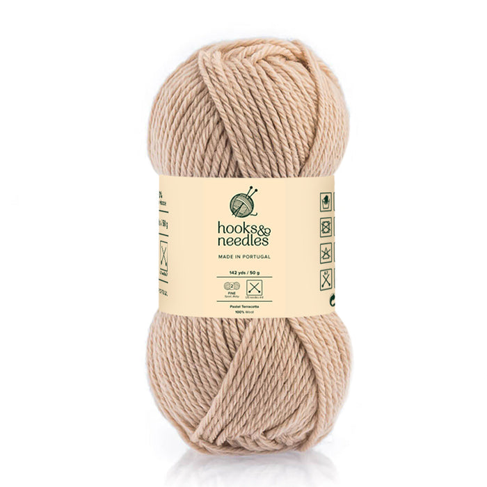 Image of Pastel Terracota yarn, showcasing its soft texture and natural hues, ideal for creating cozy, elegant knitwear.