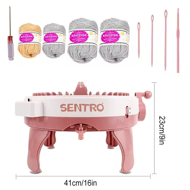 The 48 Needles Knitting Machine Kit with Row Counter (Bundle48) in pink, complete with a measuring scale of 41cm/16in by 23cm/9in, is accompanied by yarn balls, knitting needles, and a convenient screwdriver to meet all your crafting needs.