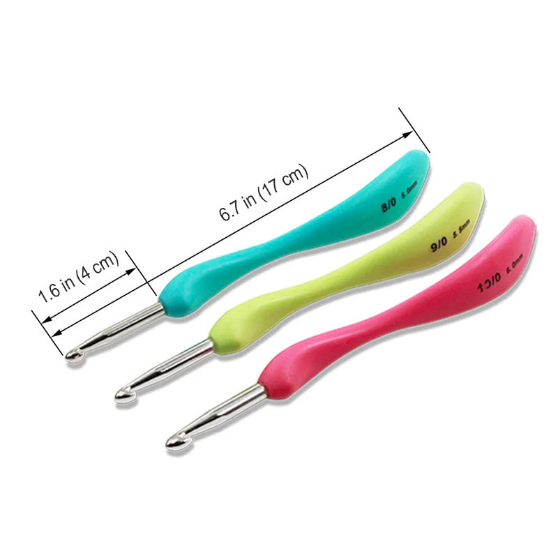 The Crochet Hook Set 8 Pcs with Soft Grip Handles includes ergonomic hooks in teal, green, and pink. Each hook is marked with various sizes and measures 6.7 inches (17 cm) in length and 1.6 inches (4 cm) in width for a comfortable crafting experience.