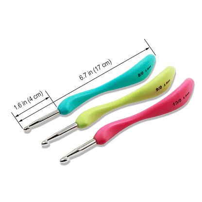 The Crochet Hook Set 8 Pcs with Soft Grip Handles includes ergonomic hooks in teal, green, and pink. Each hook is marked with various sizes and measures 6.7 inches (17 cm) in length and 1.6 inches (4 cm) in width for a comfortable crafting experience.