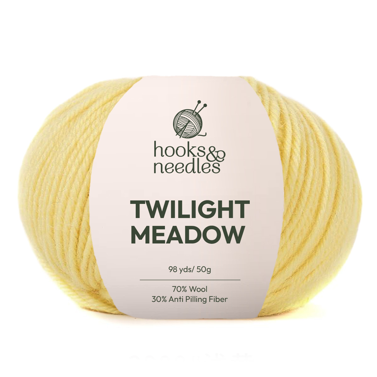 A soft, durable light yellow yarn ball labeled "Twilight Meadow Yarn, 98 yds/50g, 70% wool, 30% anti-pilling fiber"—a medium weight wool-blend perfect for cozy projects.