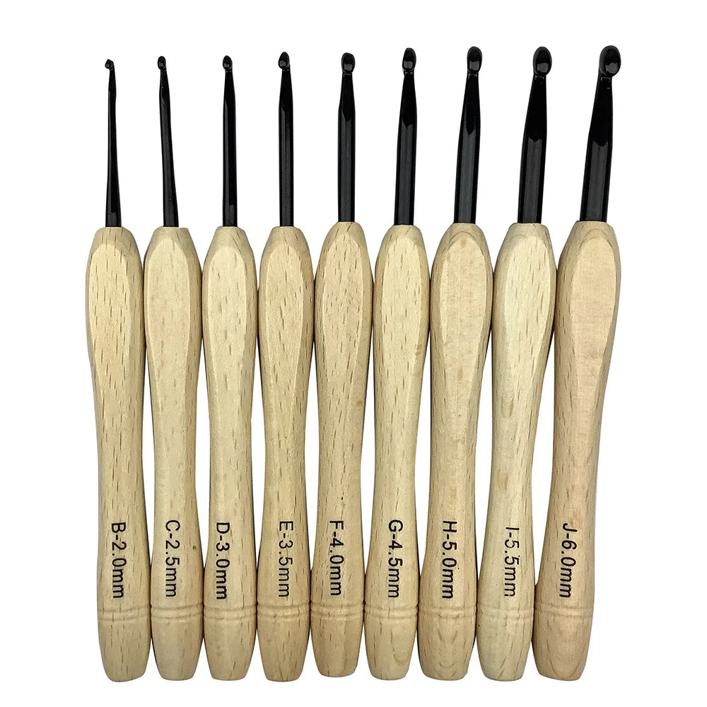 A set of Wooden Handle Crochet Hooks 9 Pcs, labeled from B (2.0mm) to J (6.0mm), arranged in size order, perfect for all your crafting needs.