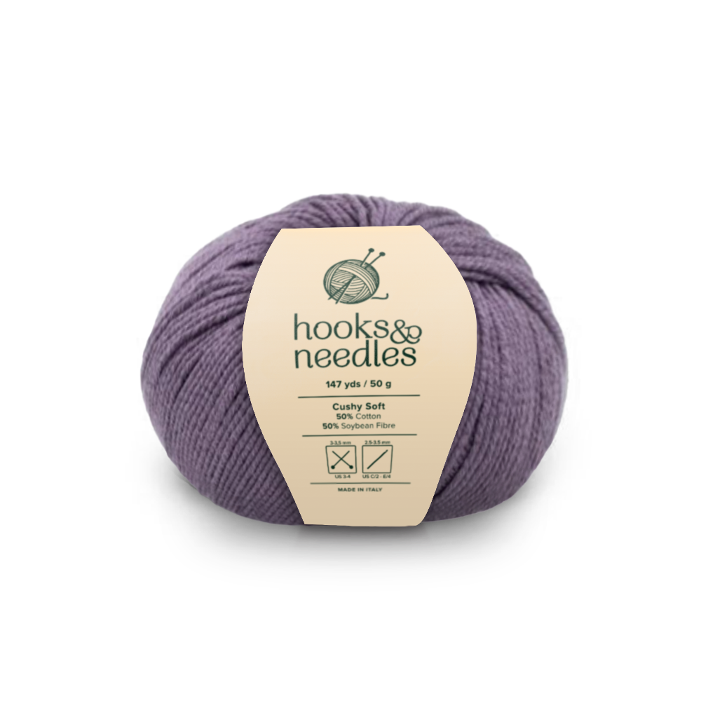 Image of Cushy Soft yarn, showcasing its soft texture and natural hues, ideal for creating cozy, elegant knitwear.