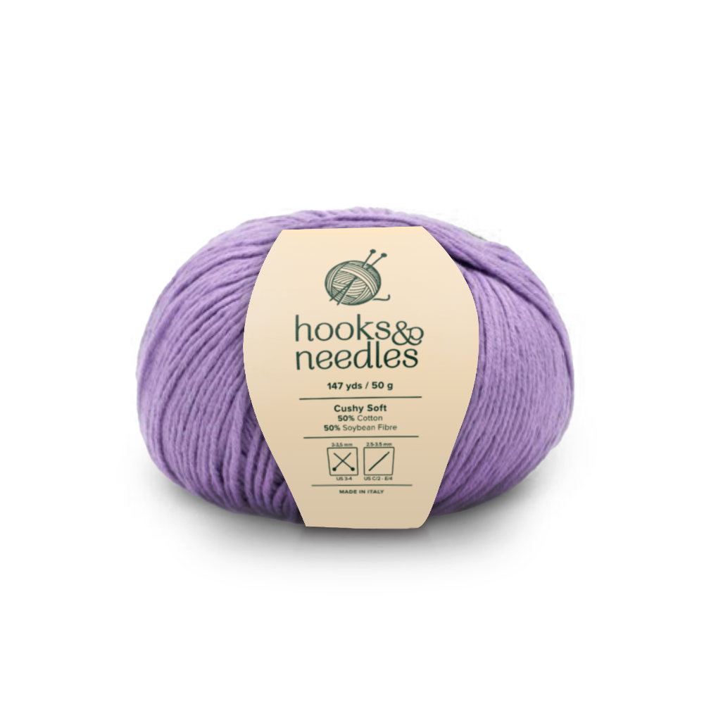 Image of Cushy Soft yarn, showcasing its soft texture and natural hues, ideal for creating cozy, elegant knitwear.