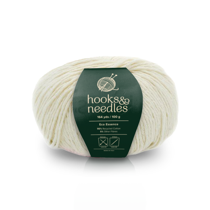 Image of Eco Essence yarn, showcasing its soft texture and natural hues, ideal for creating cozy, elegant knitwear.