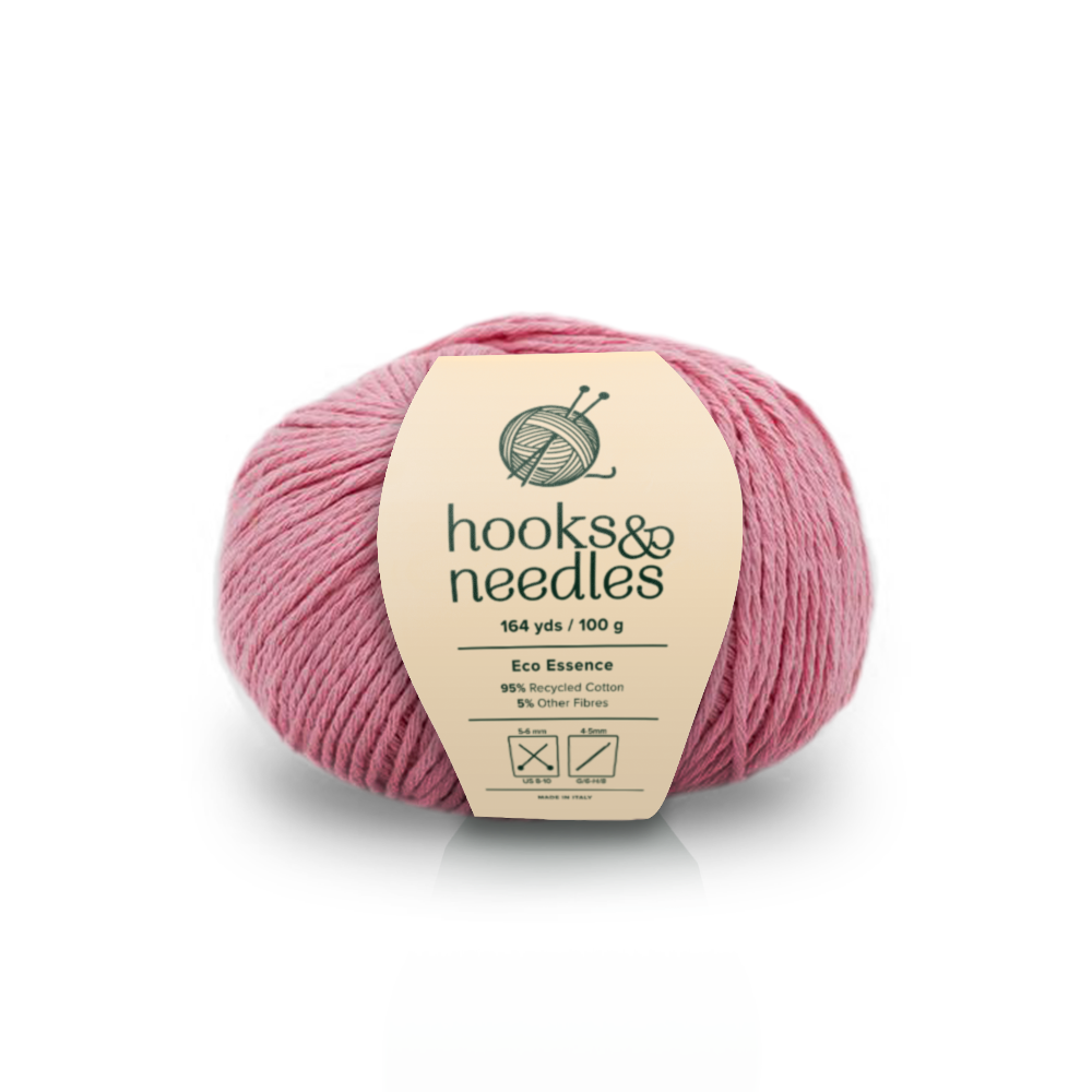 Image of Eco Essence yarn, showcasing its soft texture and natural hues, ideal for creating cozy, elegant knitwear.