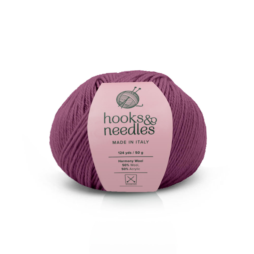 Image of Harmony Wool yarn, showcasing its soft texture, ideal for creating cozy, elegant knitwear.