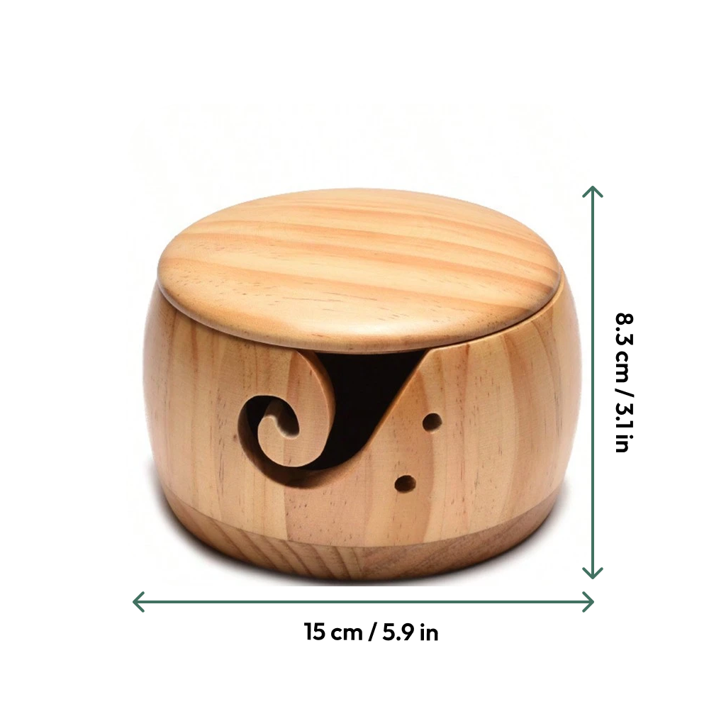Wooden Yarn Bowl With Lid has a swirl cutout, high gloss finish, and comes with a lid. It measures 8.3 cm (3.1 in) tall and 15 cm (5.9 in) wide, shown with measurement arrows.